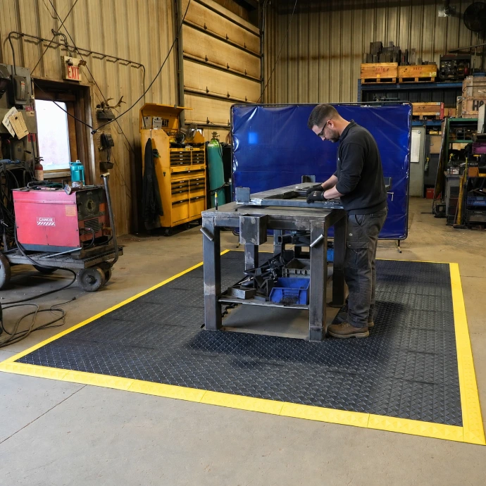 Rebourne H1 anti-fatigue mat at welding station