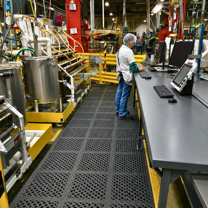 Rebourne H9 antimicrobial anti-fatigue mat in a food production company